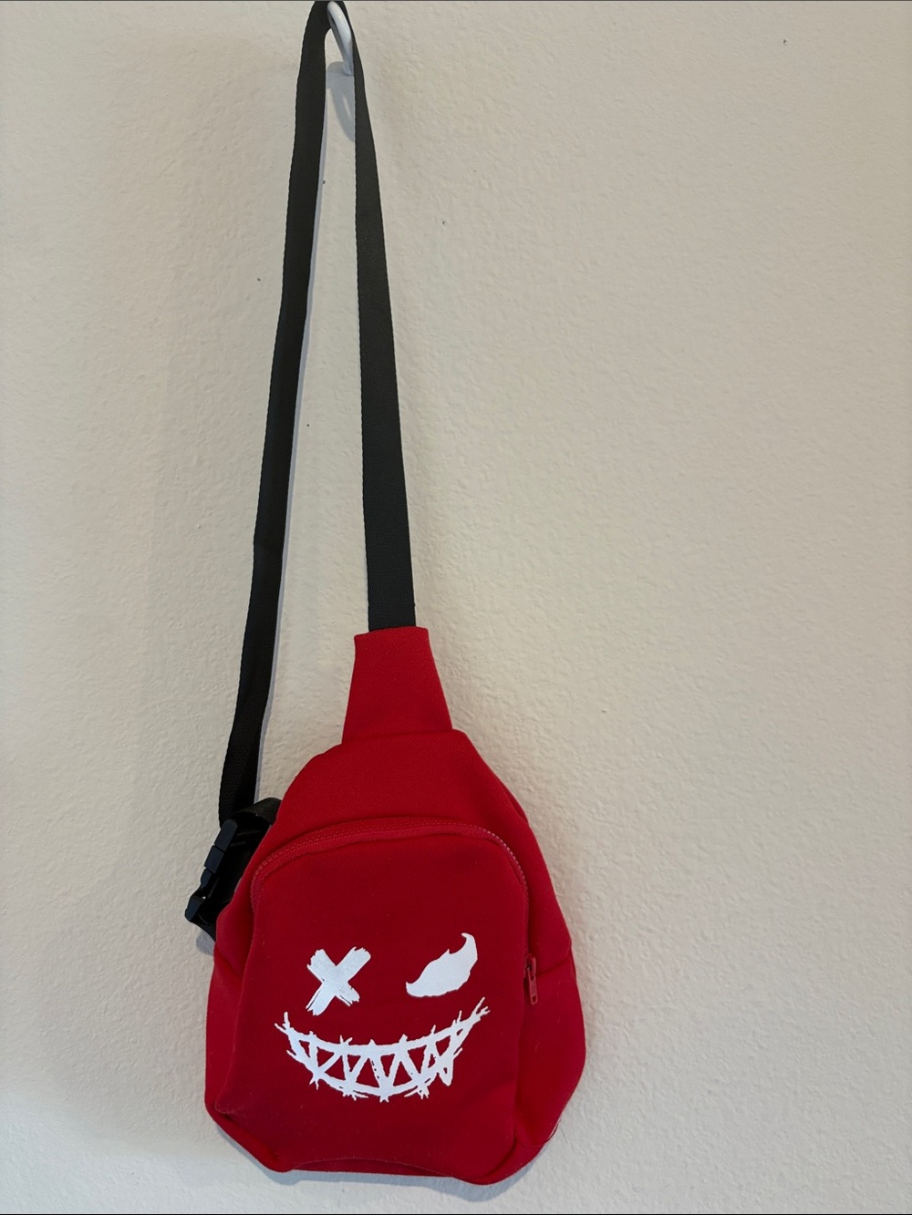 Red sling bag